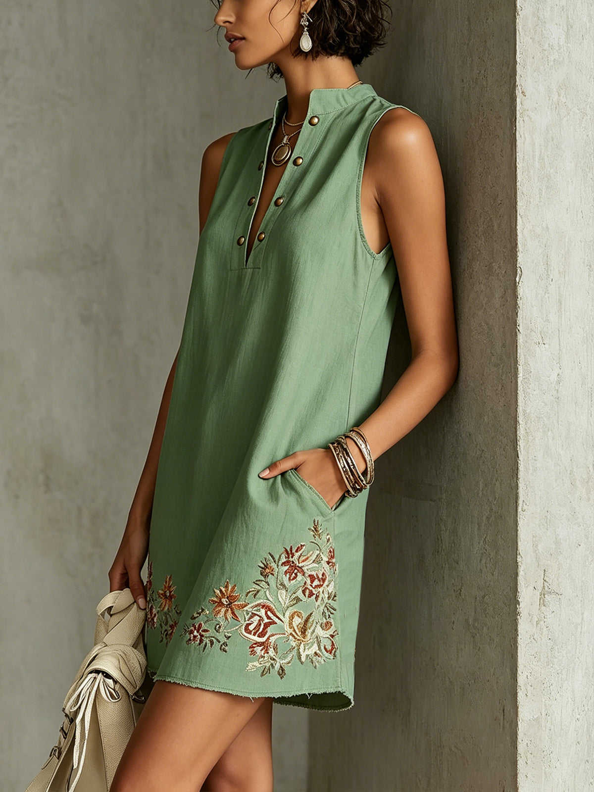 Green Sleeveless Mini Dress With Floral Embroidery And Button Detail