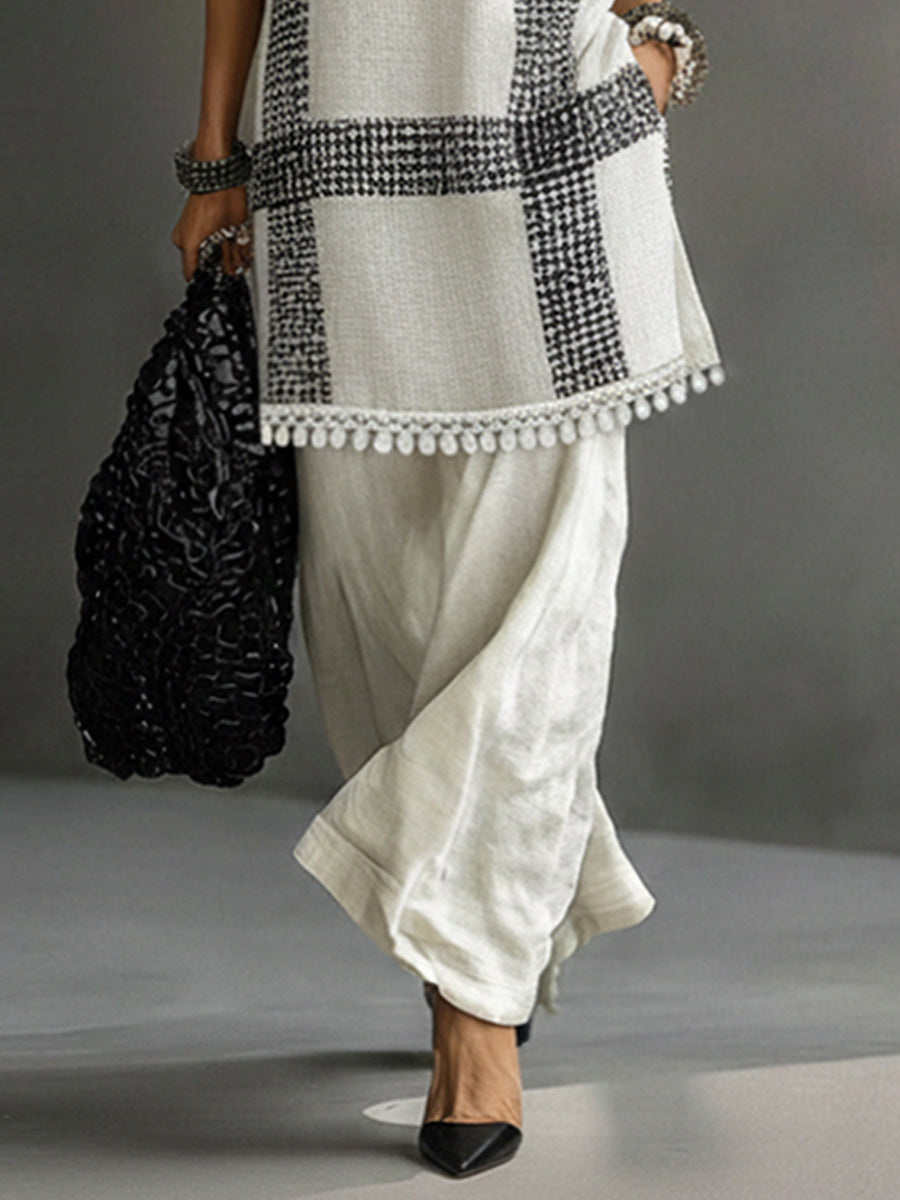 Beige Lightweight Knitted Sleeveless Top With Tassel Hem