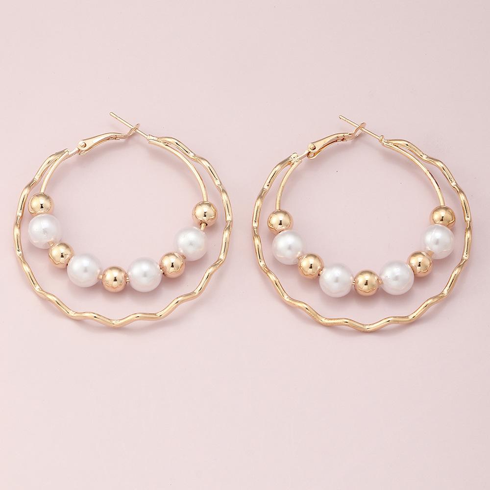Boucles d'oreilles créoles à perles double couche