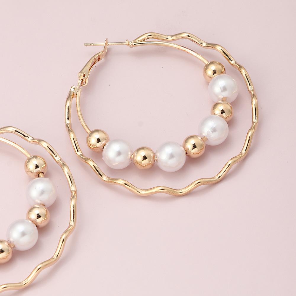 Boucles d'oreilles créoles à perles double couche
