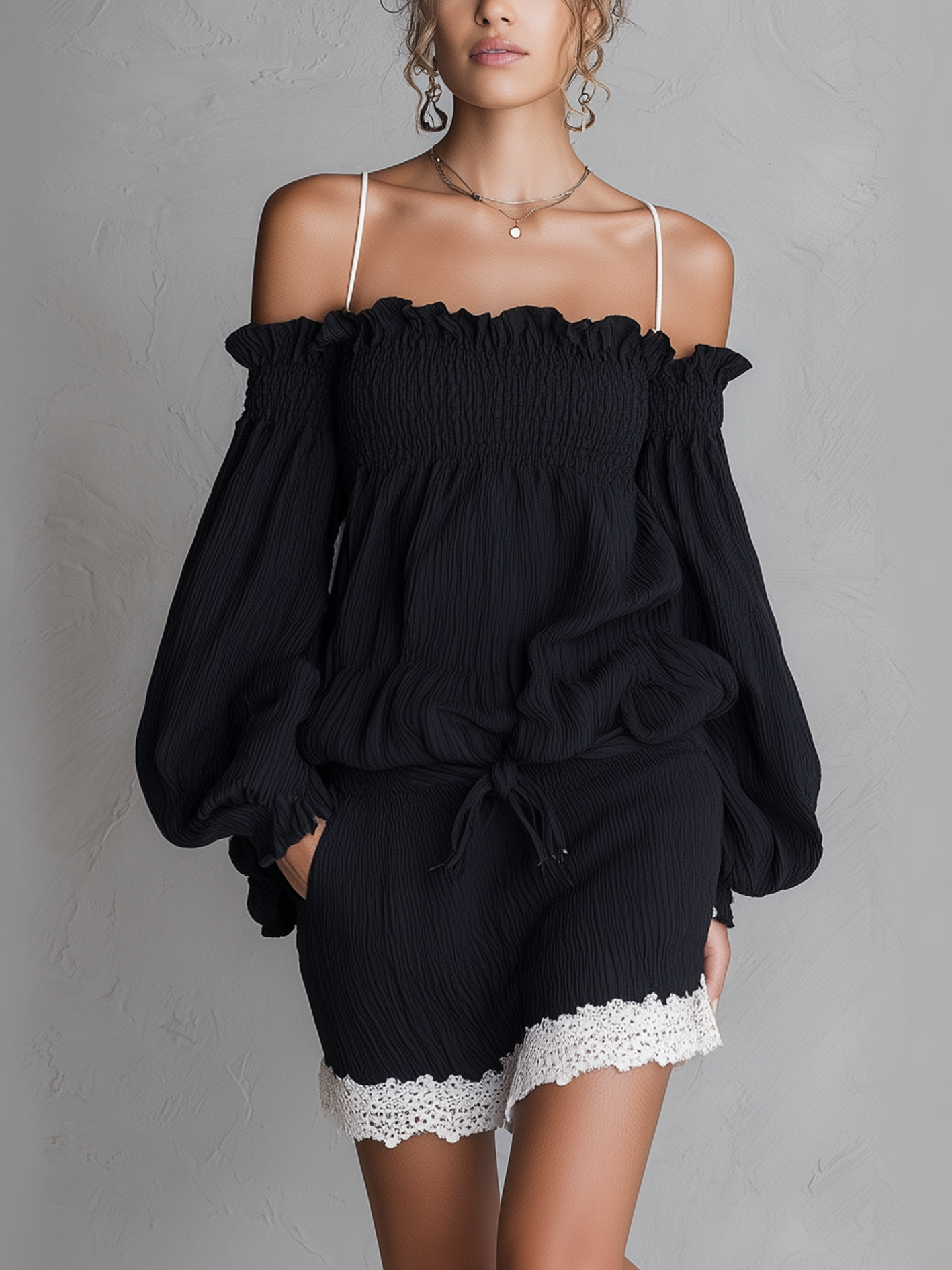 Off Shoulder Textured Black Mini Dress With Ruffled Sleeves And White Lace Hem