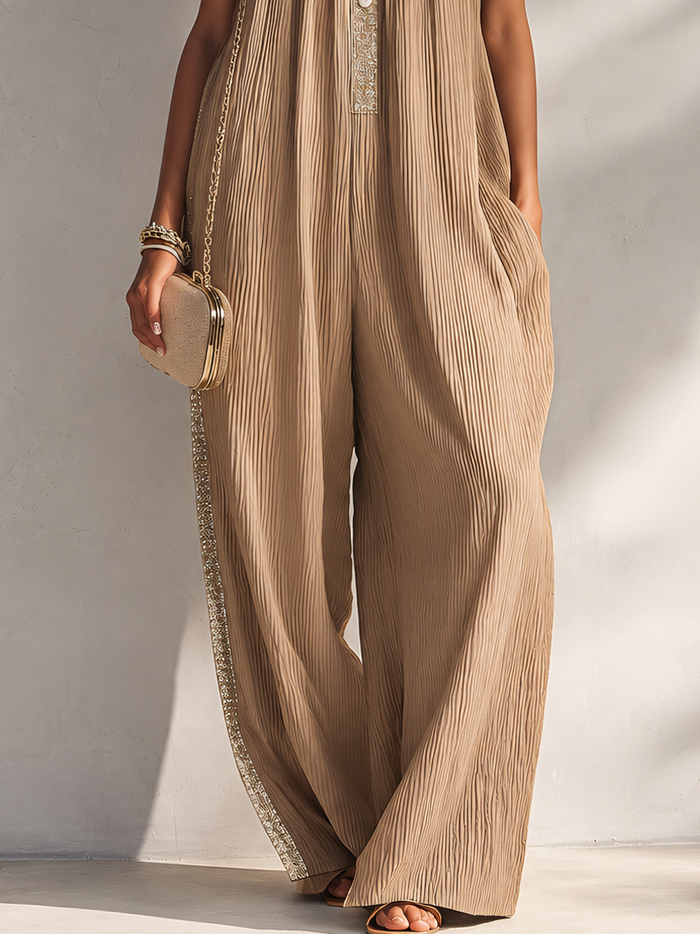 Beige Textured Sleeveless Jumpsuit With Lace Trim And Button