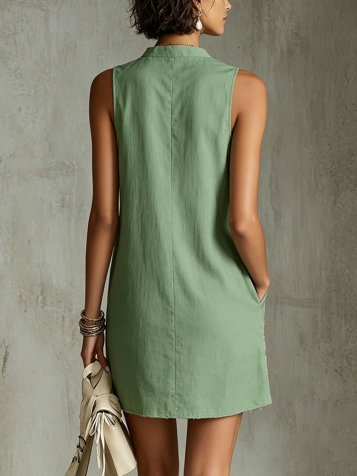 Green Sleeveless Mini Dress With Floral Embroidery And Button Detail