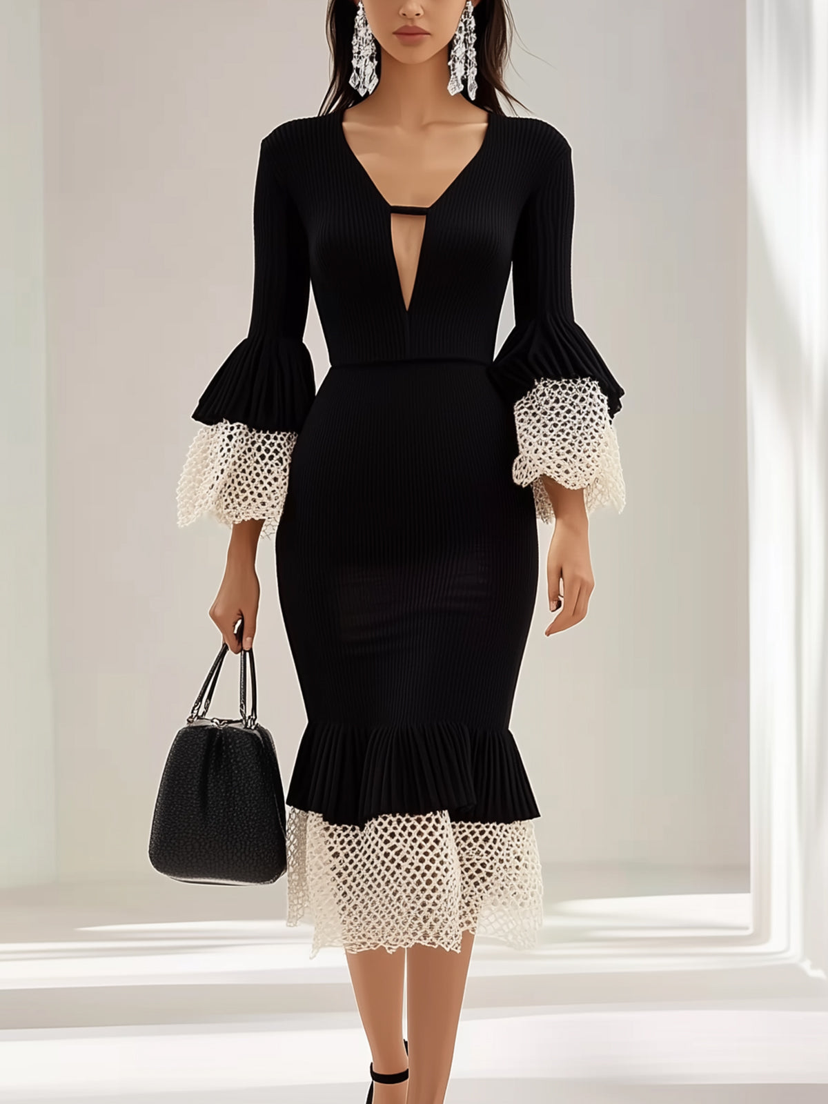 Black Ribbed Dress With White Cuffs And Hem