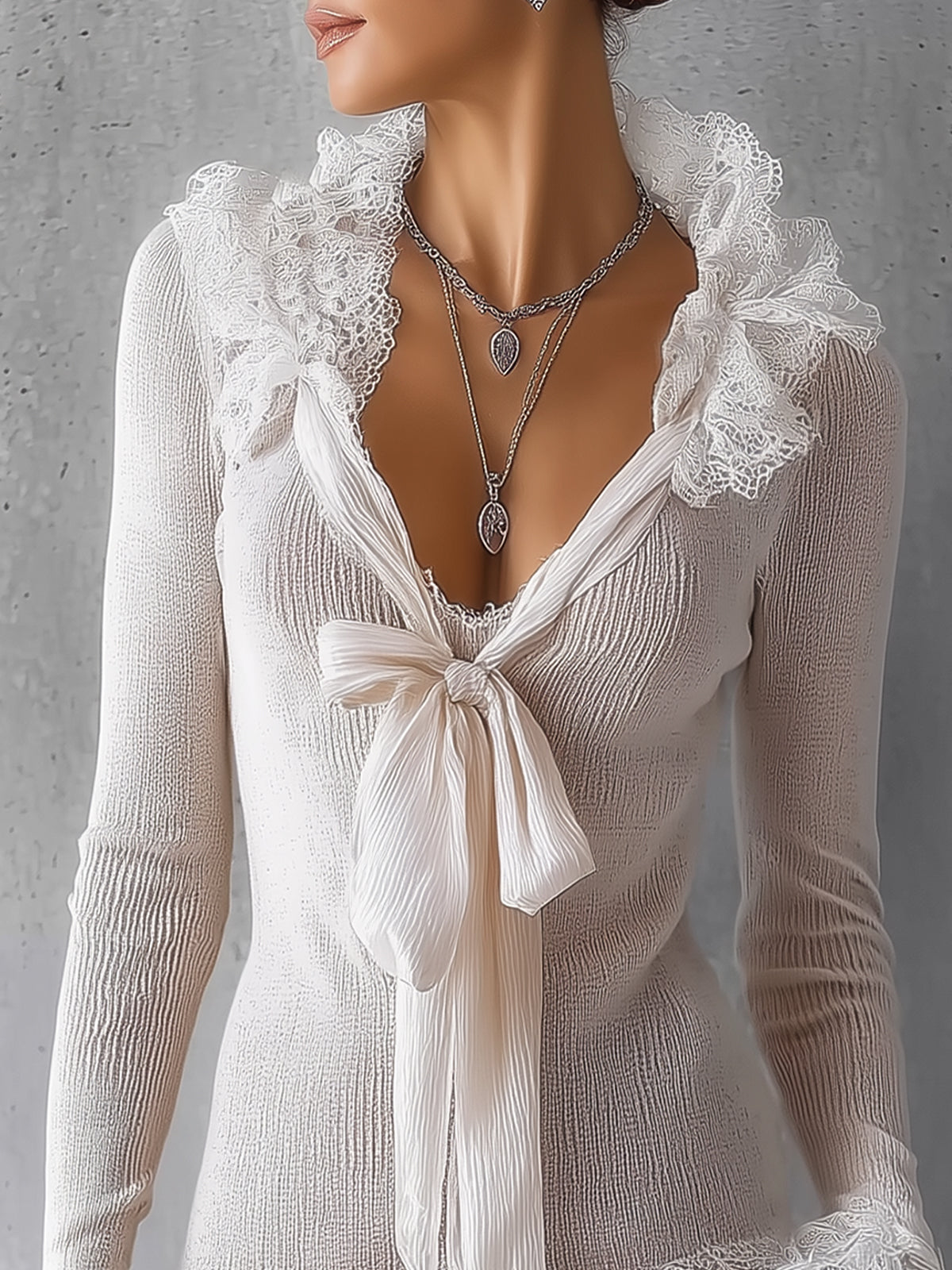 White Lace-Trim Sweater With Bow Tie Neck And Flared Cuffs
