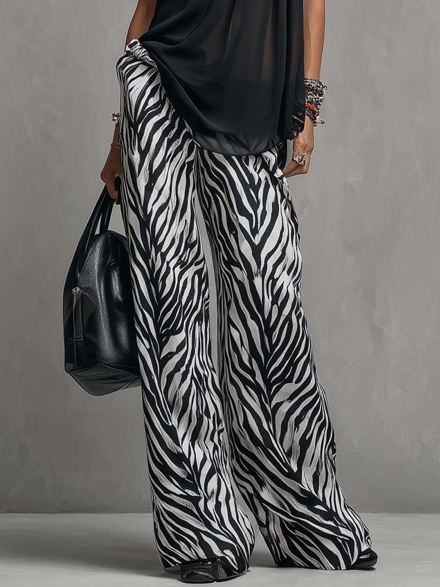 Black Chiffon Sleeveless Top And Zebra Print Wide Leg Pants Set