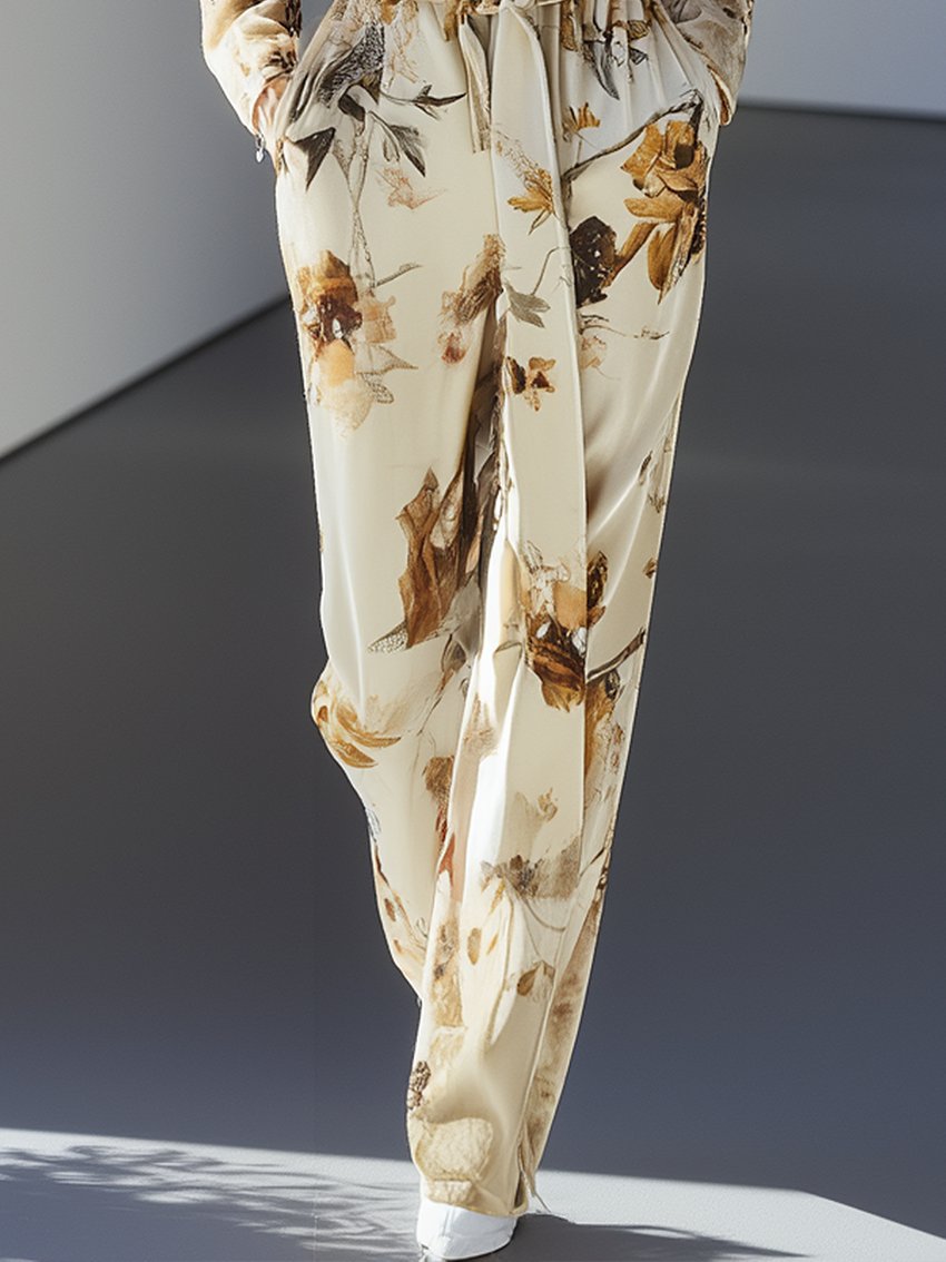 Cream Velvet Jumpsuit With Belt And Elegant Floral Print