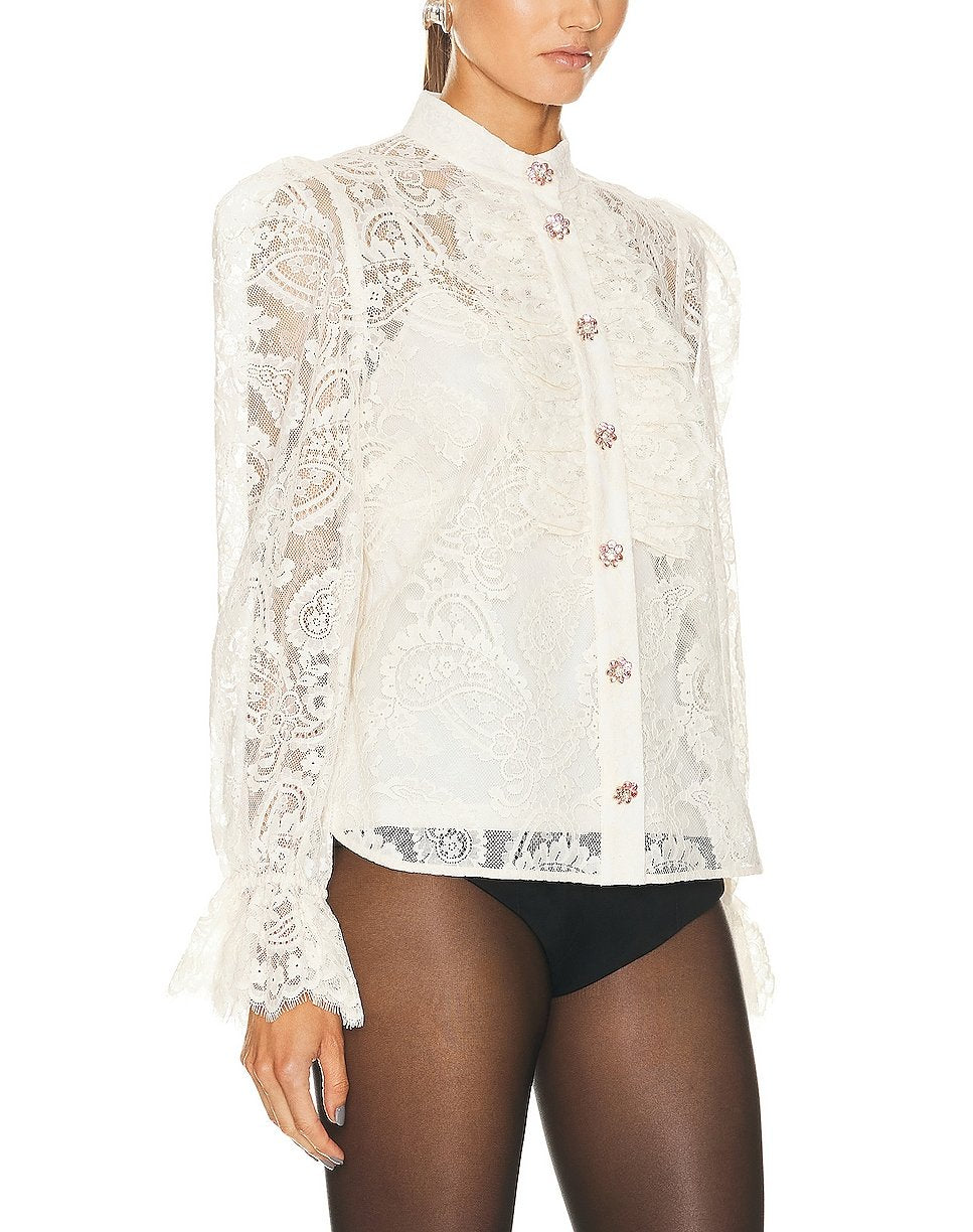 Blouse en dentelle blanche