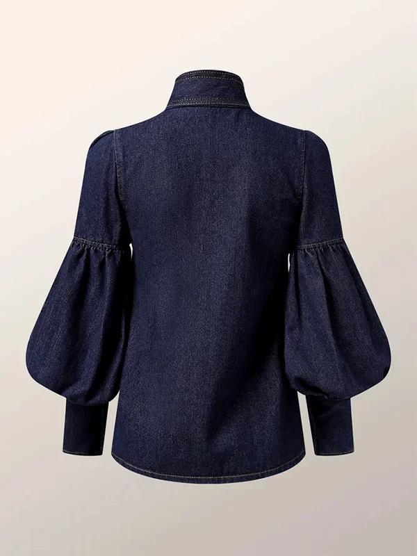 Chemise ornée d'un nœud à manches bouffantes